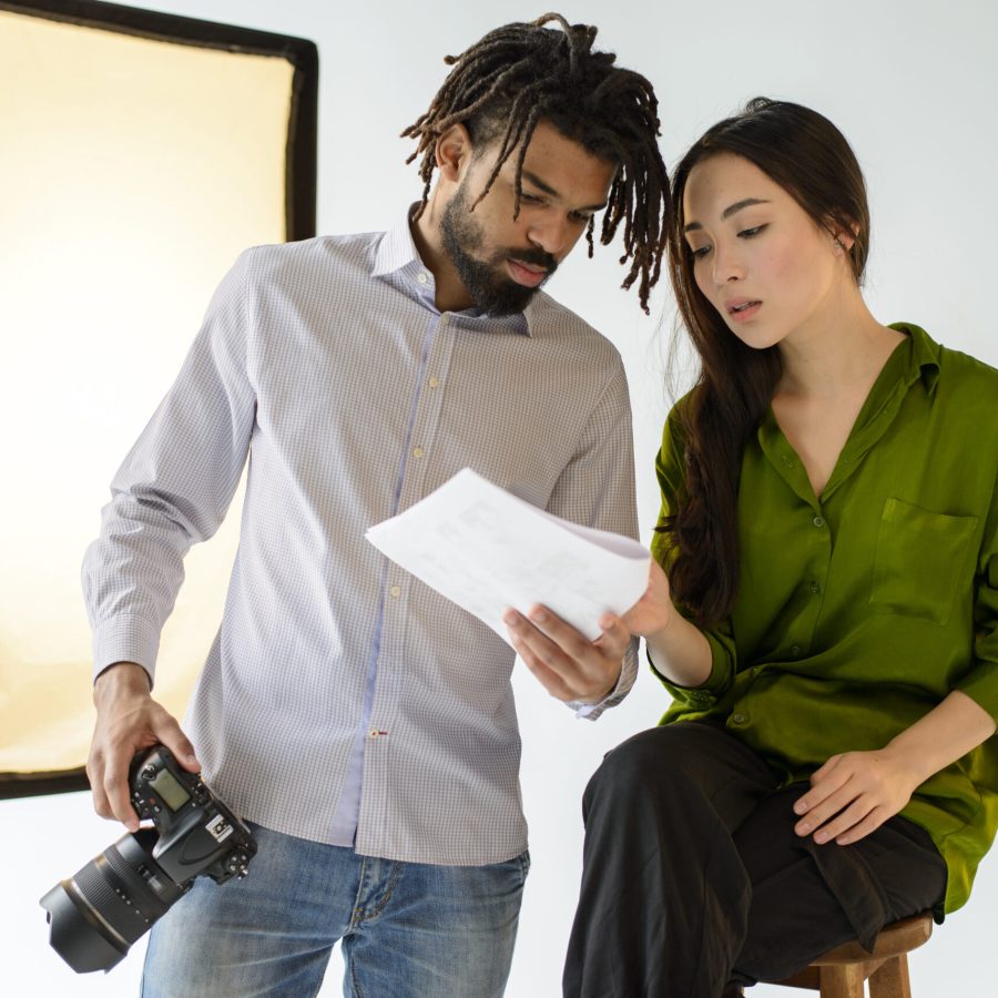 man-holding-professional-camera man-holding-professional-camera